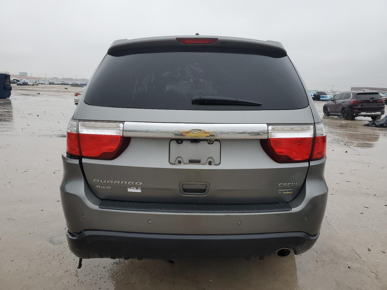 2012 Dodge Durango VIN 1C4RDJDG3CC129409 Copart auction photo, side / rear end damage thumbnail 6