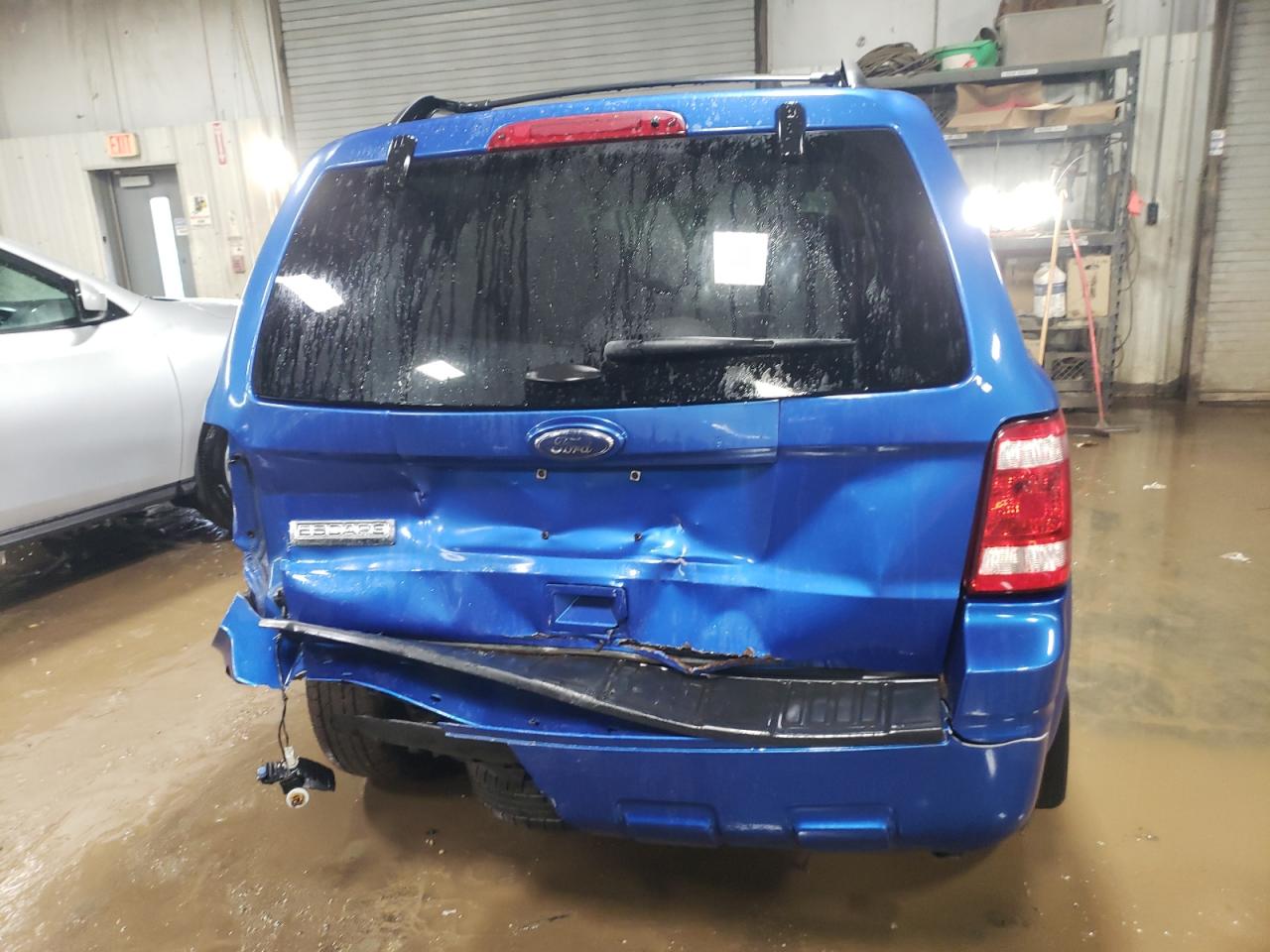 2012 Ford Escape VIN 1FMCU9D72CKA21238 Copart auction photo, rear end / minor dent/scratches damage thumbnail 6