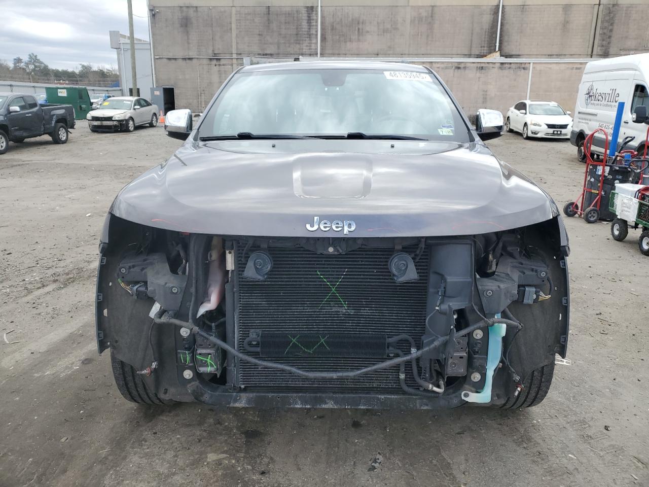 2015 Jeep Grand Cherokee VIN 1C4RJFBG7FC693366 Copart auction photo, rear end / front end damage thumbnail 5
