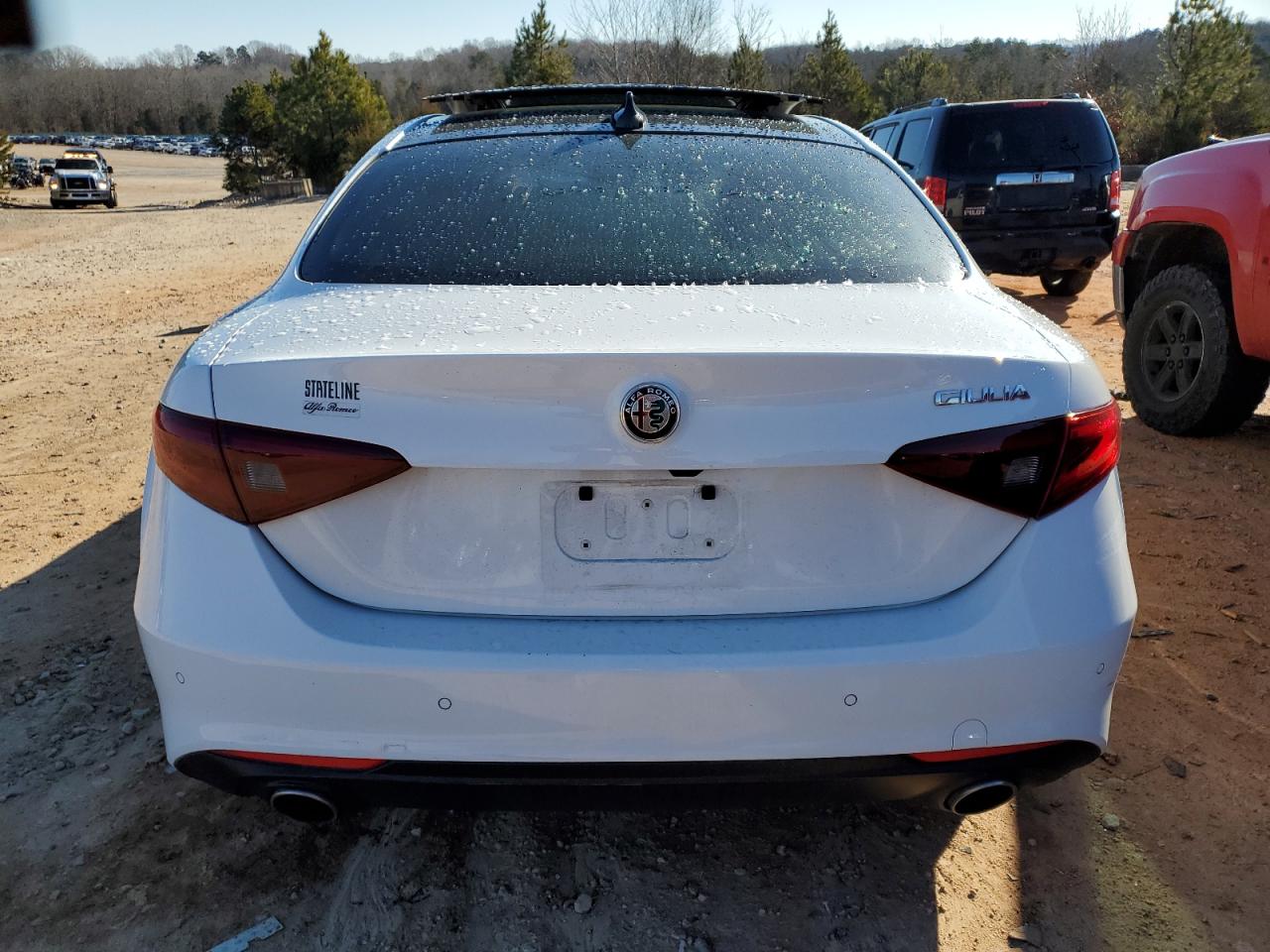 2021 Alfa Romeo Giulia VIN ZARFAMBN2M7640415 Copart auction photo, all over damage thumbnail 6