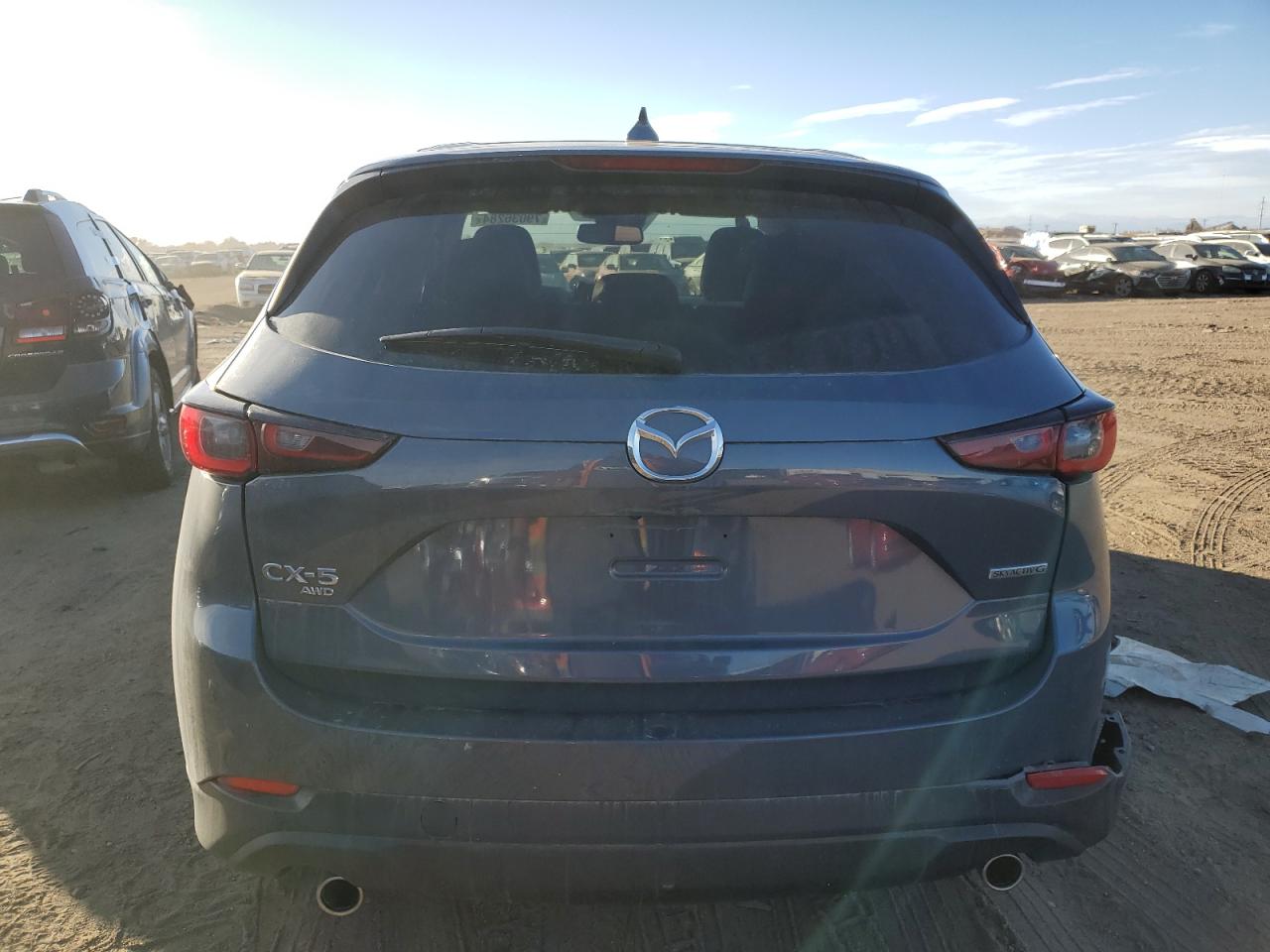 2023 Mazda CX-5 VIN JM3KFBCM4P0237805 Copart auction photo, side / rear end damage thumbnail 6