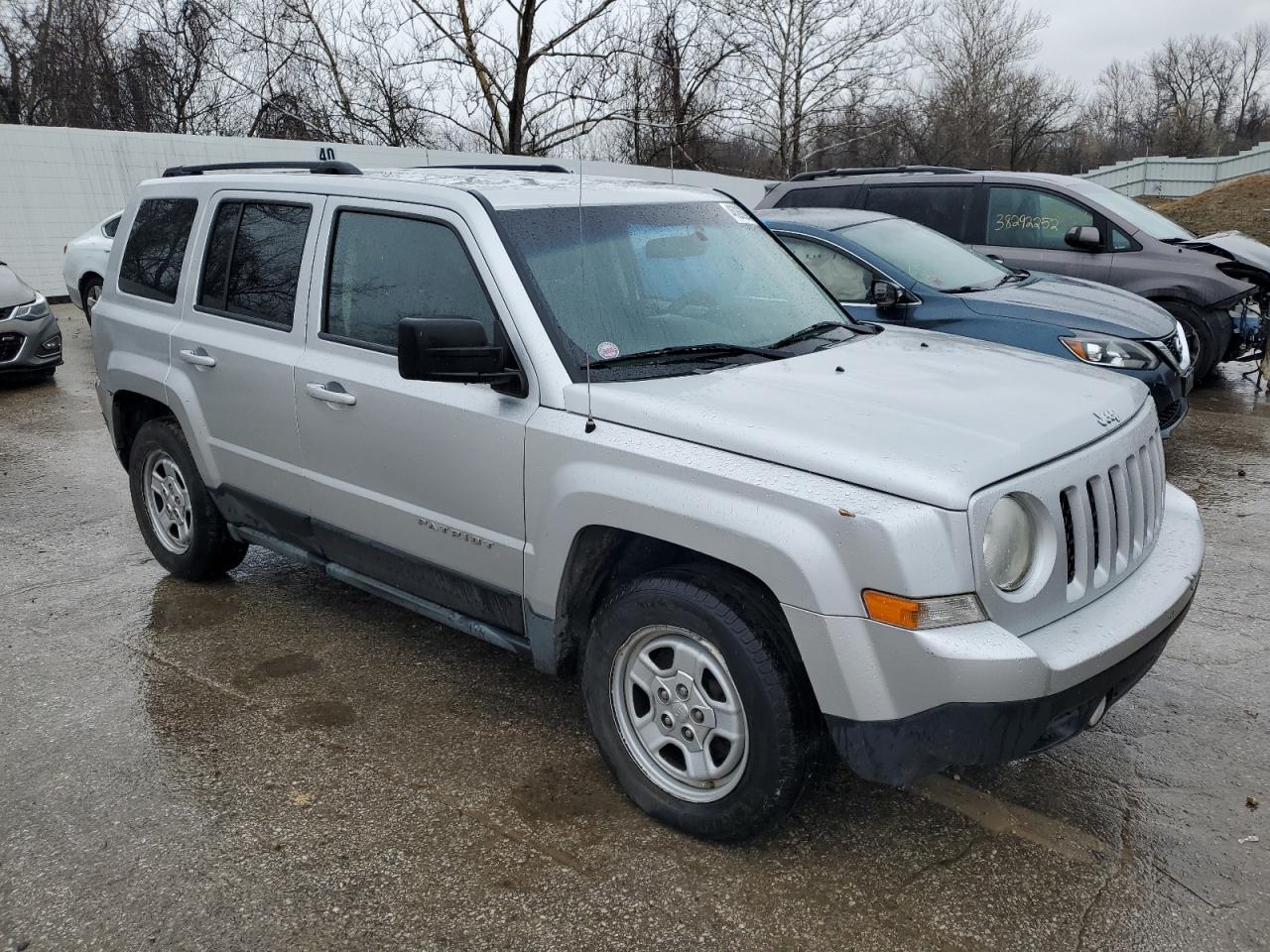 2011 Jeep Liberty (Patriot) VIN 1J4NT1GA7BD156981 Copart auction photo, side / front end damage thumbnail 4