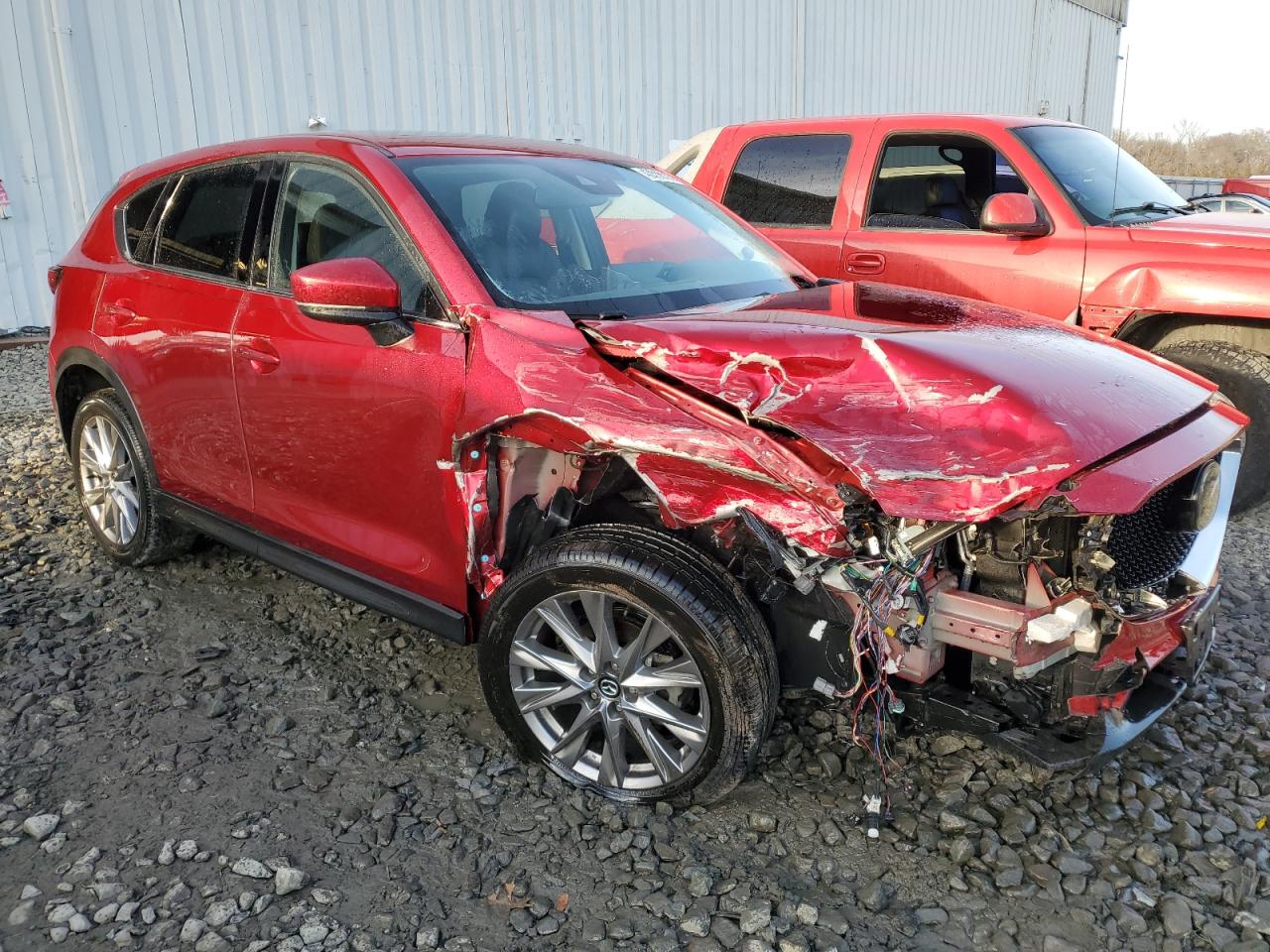 2021 Mazda CX-5 VIN JM3KFBDM2M1428546 Copart auction photo, front end / side damage thumbnail 4