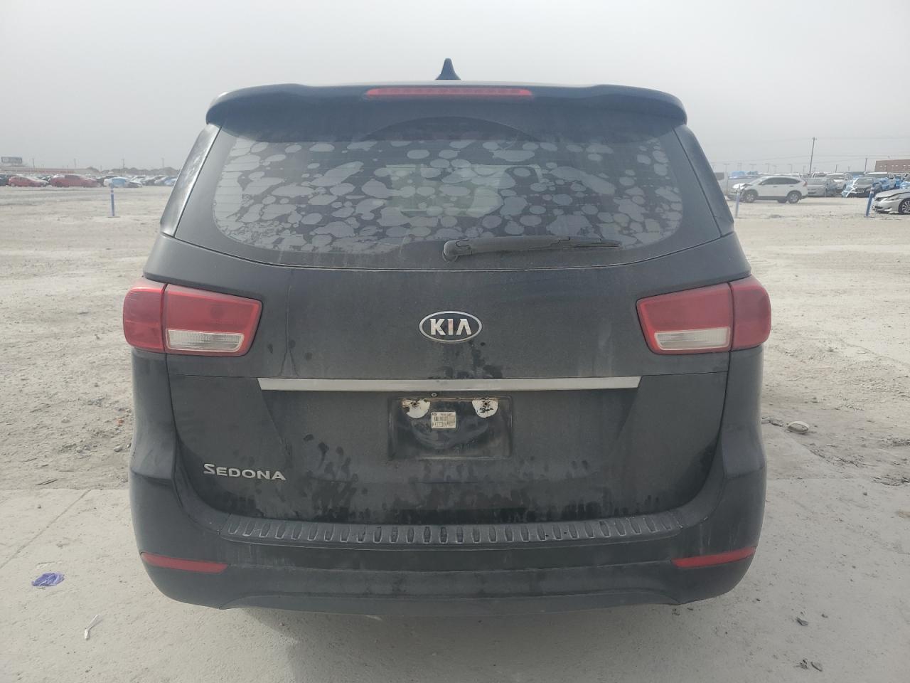 2016 KIA Sedona VIN KNDMA5C11G6106917 Copart auction photo, front end / minor dent/scratches damage thumbnail 6
