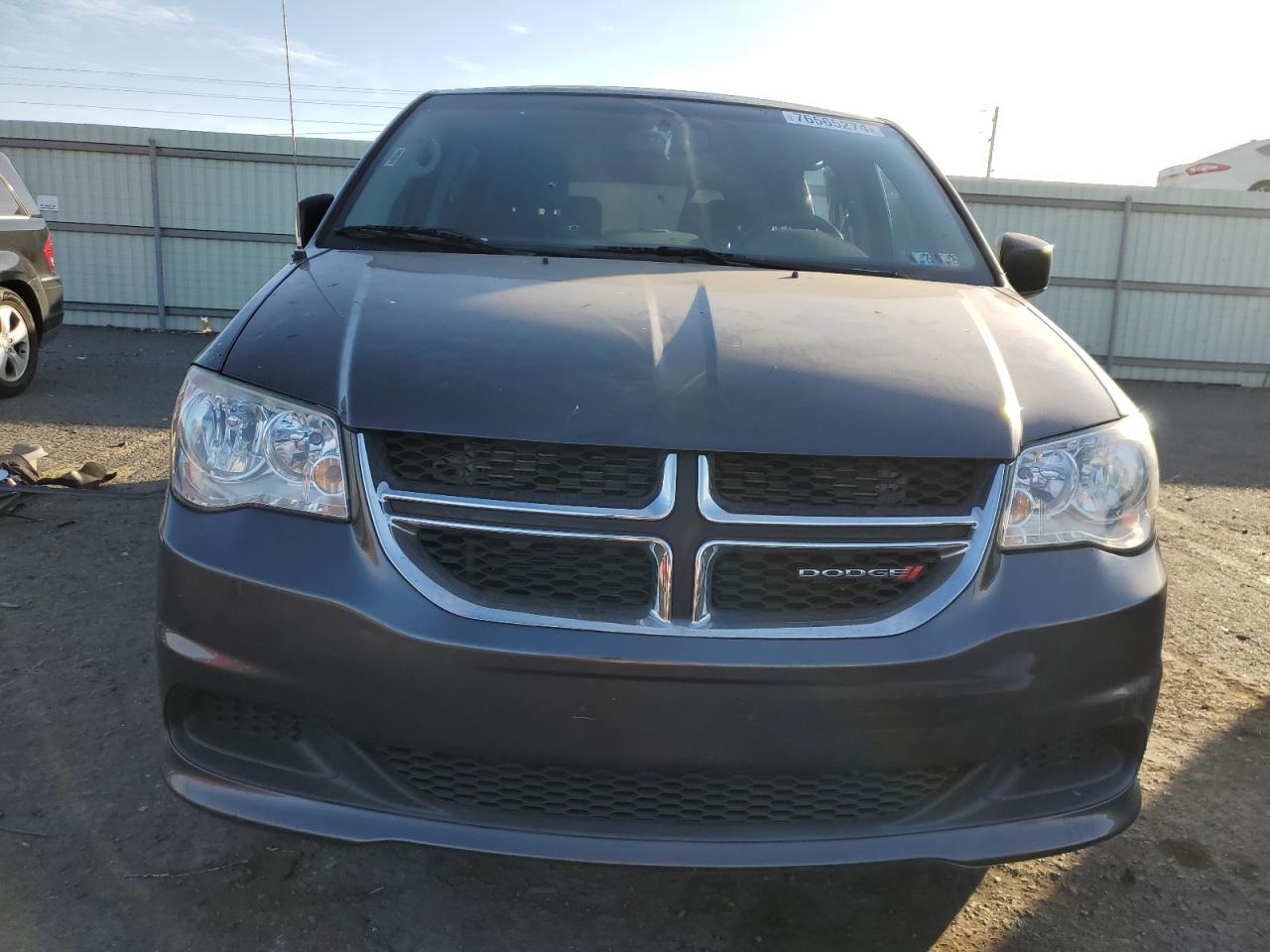 2015 Dodge Caravan VIN 2C4RDGBG0FR599057 Copart auction photo, rear end / side damage thumbnail 5