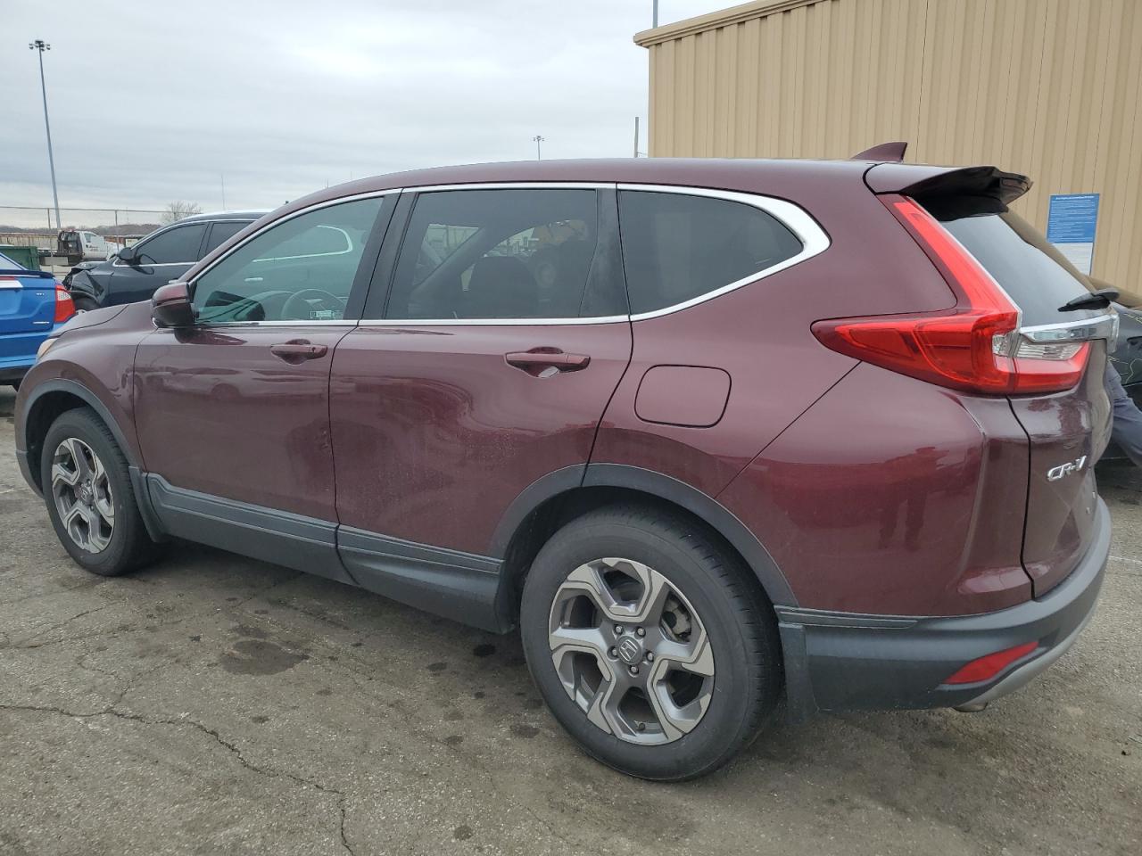 2019 Honda CR-V VIN 2HKRW2H52KH662895 Copart auction photo, side / front end damage thumbnail 2