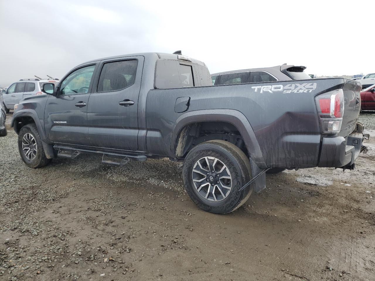 2022 Toyota Tacoma VIN 3TMDZ5BN0NM136842 Copart auction photo, rollover damage thumbnail 2