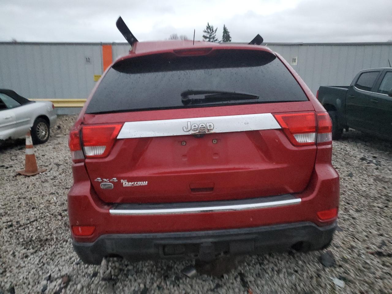 2011 Jeep Grand Cherokee VIN 1J4RR6GTXBC700412 Copart auction photo, all over damage thumbnail 6
