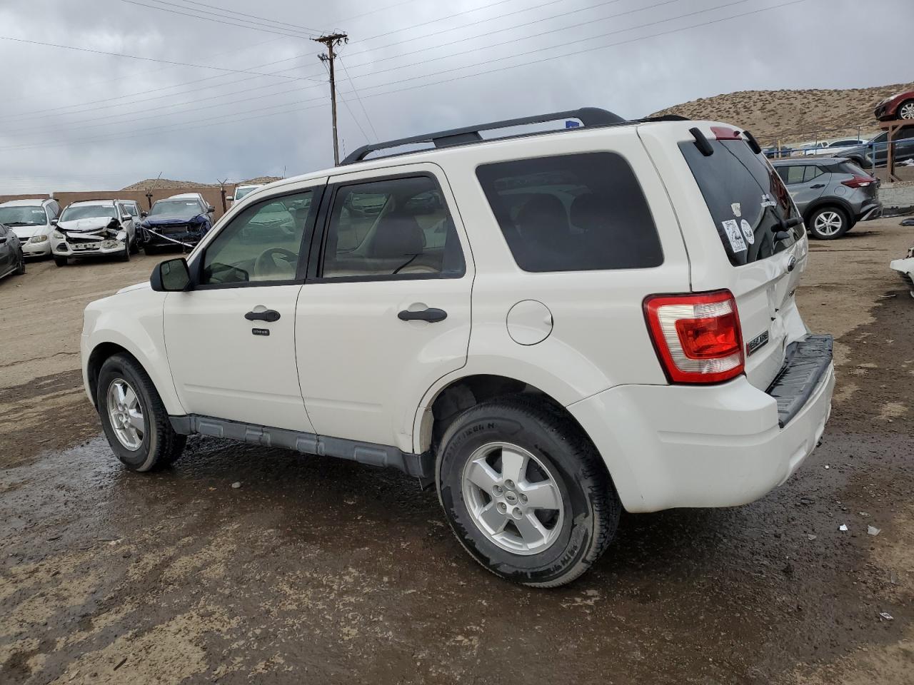 2011 Ford Escape VIN 1FMCU0DG0BKB91074 Copart auction photo, rear end damage thumbnail 2
