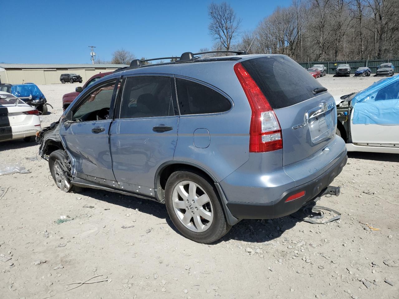 2009 Honda CR-V VIN JHLRE38599C011944 Copart auction photo, front end / side damage thumbnail 2