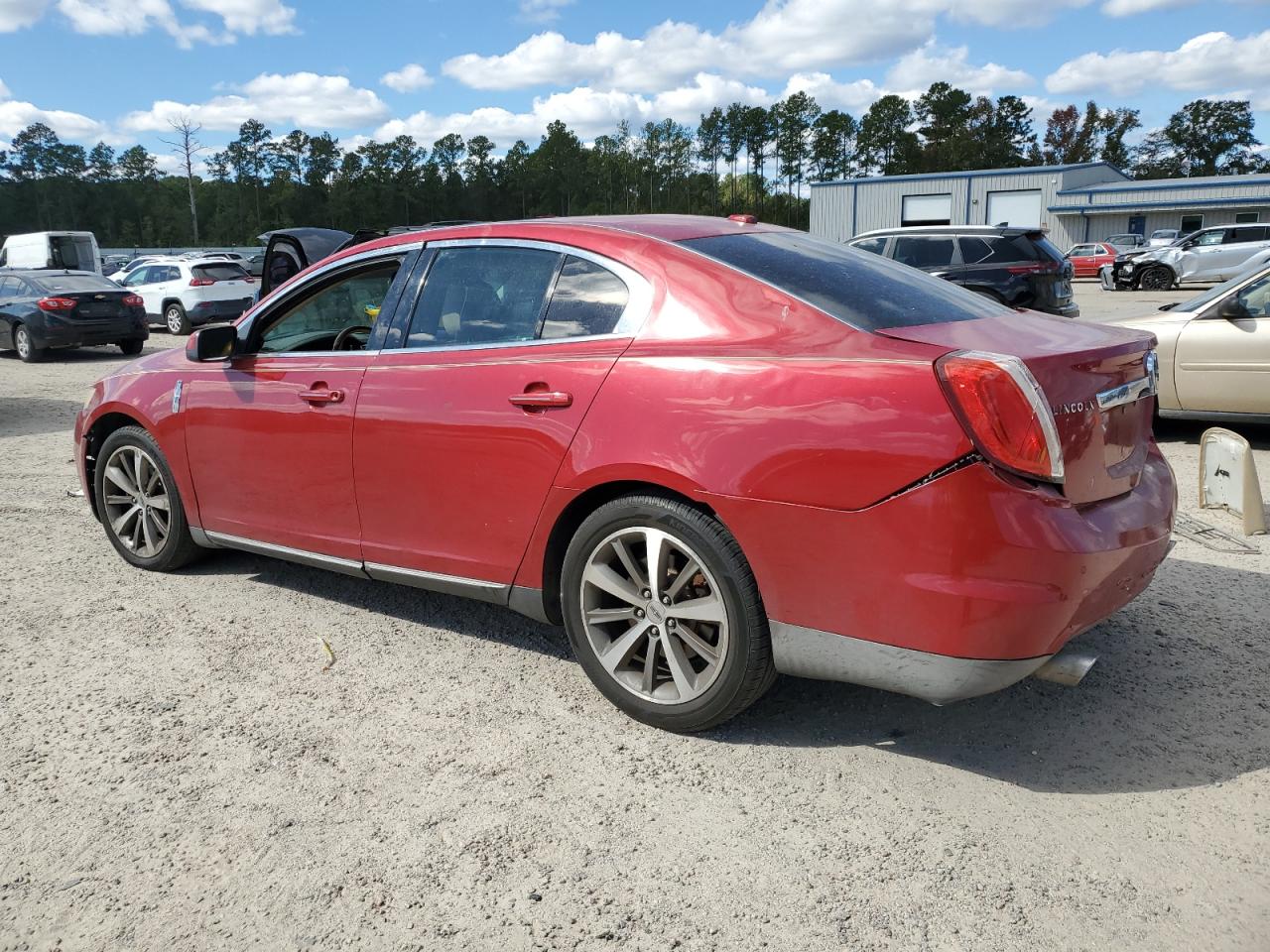 2009 Lincoln MKS VIN 1LNHM94R59G610934 Copart auction photo, front end / rear end damage thumbnail 2