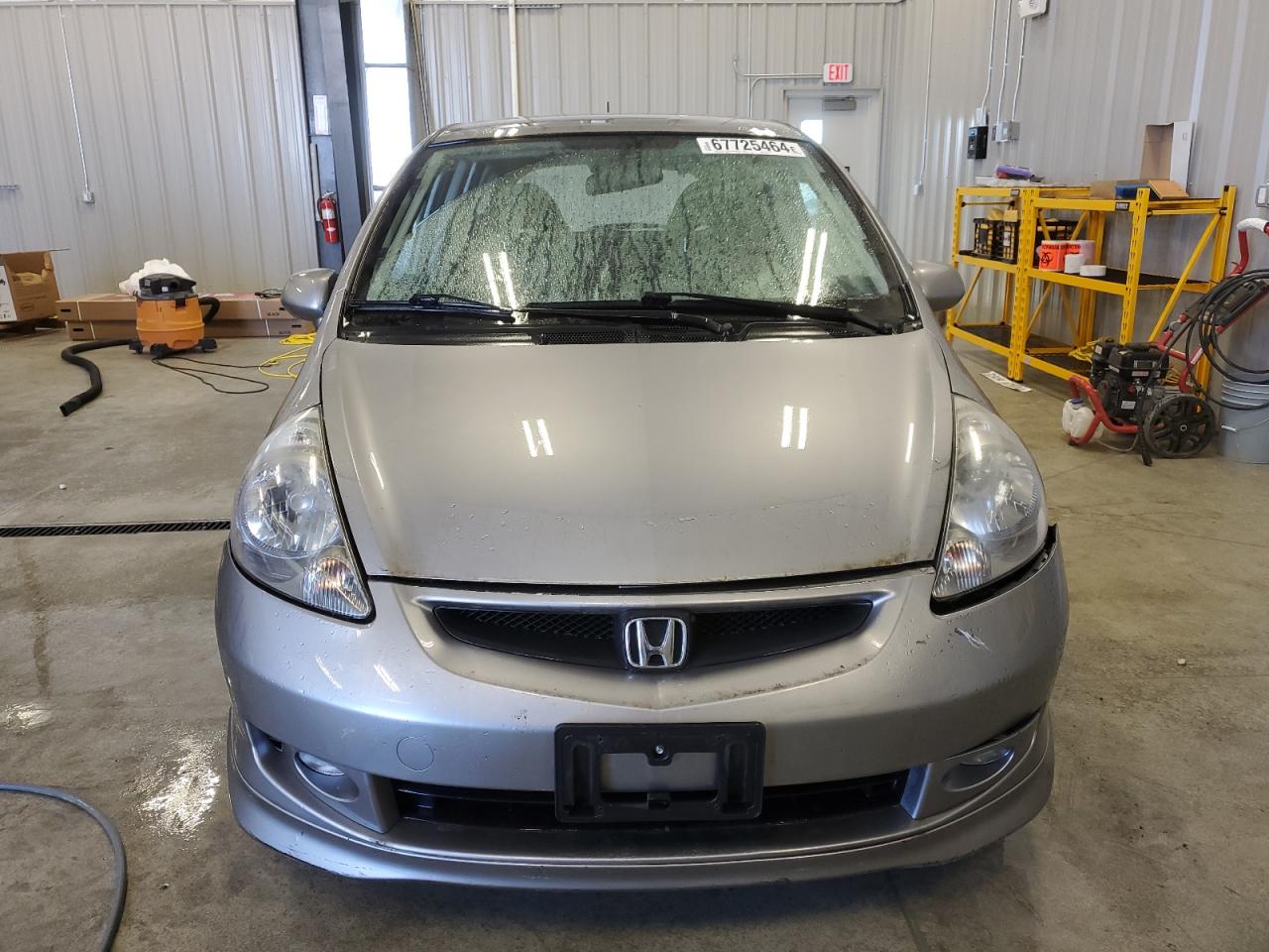 2007 Honda Fit VIN JHMGD38697S014750 Copart auction photo, side damage thumbnail 5