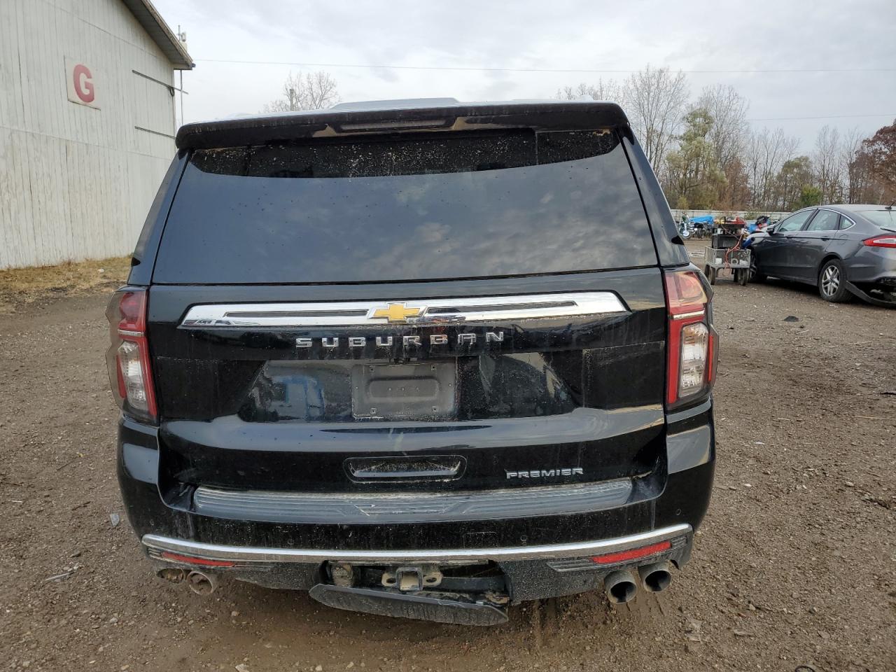 2021 Chevrolet Suburban VIN 1GNSKFKD8MR358770 Copart auction photo, side / rear end damage thumbnail 6