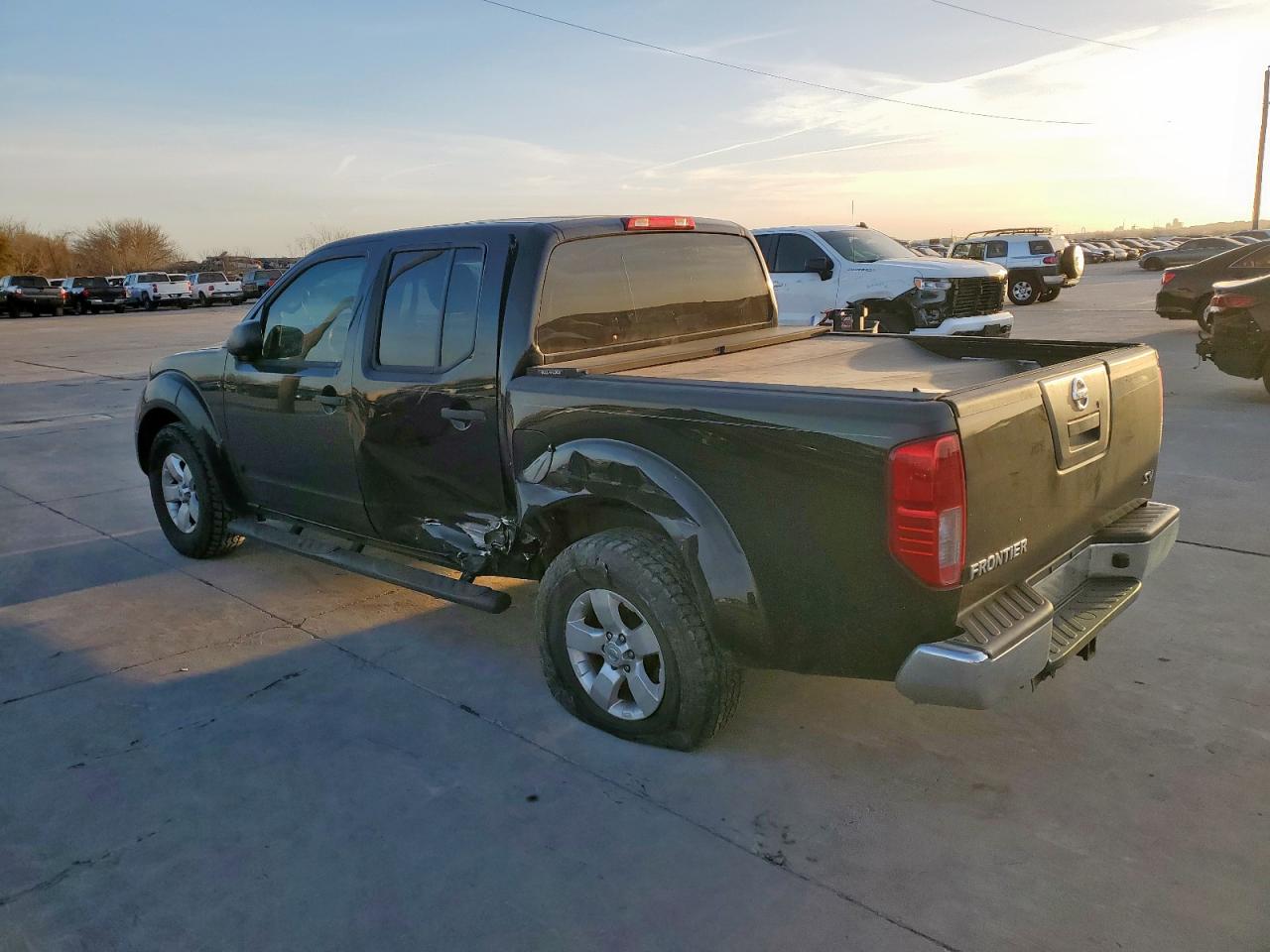 2012 Nissan Navara (Frontier) VIN 1N6AD0ER3CC410145 Copart auction photo, side / rear end damage thumbnail 2