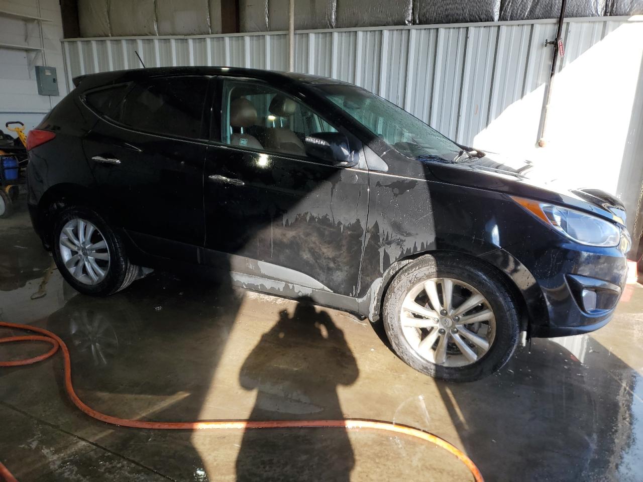 2011 Hyundai Tucson VIN KM8JU3AC0BU187802 Copart auction photo, undercarriage damage thumbnail 4