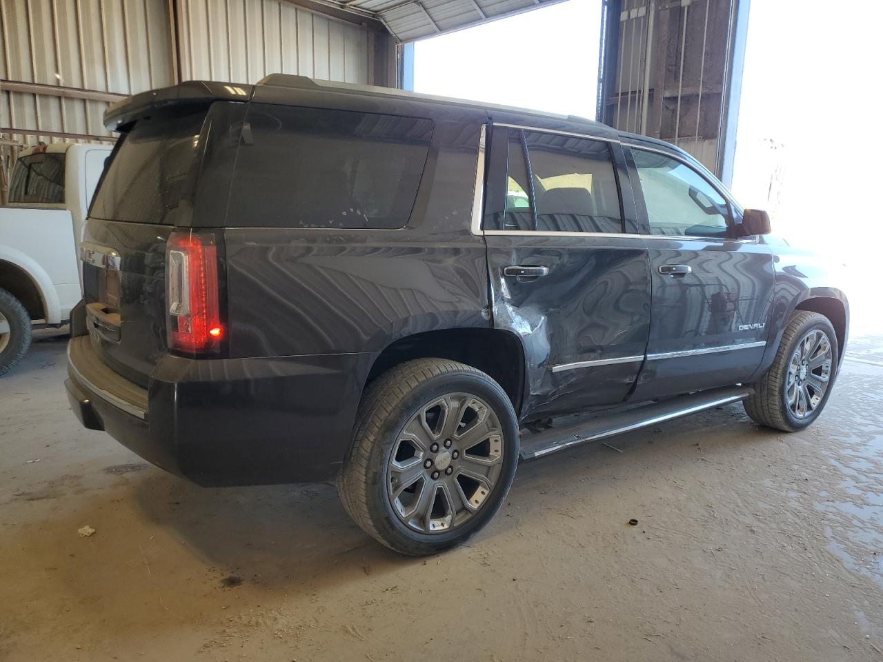 2015 GMC Yukon VIN 1GKS2CKJ2FR565949 Copart auction photo, side / hail damage thumbnail 3