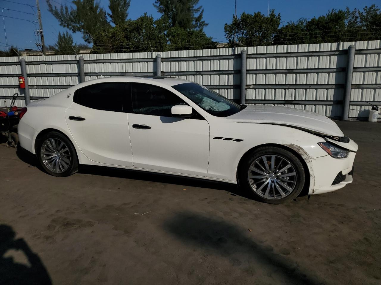 2015 Maserati Ghibli VIN ZAM57RTA7F1142144 Copart auction photo, front end / side damage thumbnail 4