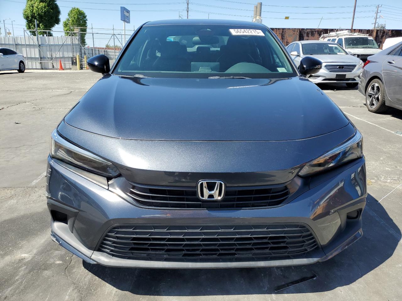 2023 Honda Civic VIN 2HGFE2F52PH517897 Copart auction photo, all over / undercarriage damage thumbnail 5