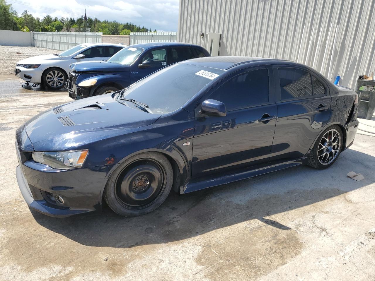 2014 Mitsubishi Lancer Evolution VIN JA32W5FV7EU014404 - Copart auction photo
