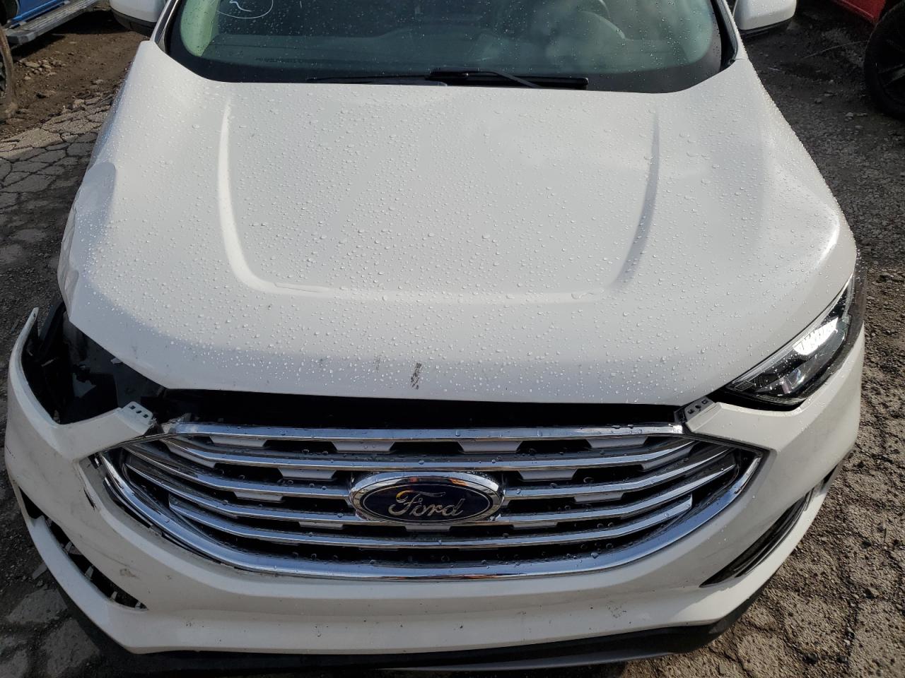 2021 Ford Edge VIN 2FMPK4J93MBA04315 Copart auction photo, front end damage thumbnail 12