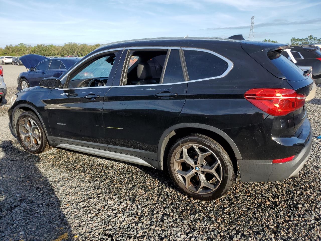 2017 BMW X1 VIN WBXHU7C39H5H33206 Copart auction photo, water/flood damage thumbnail 2