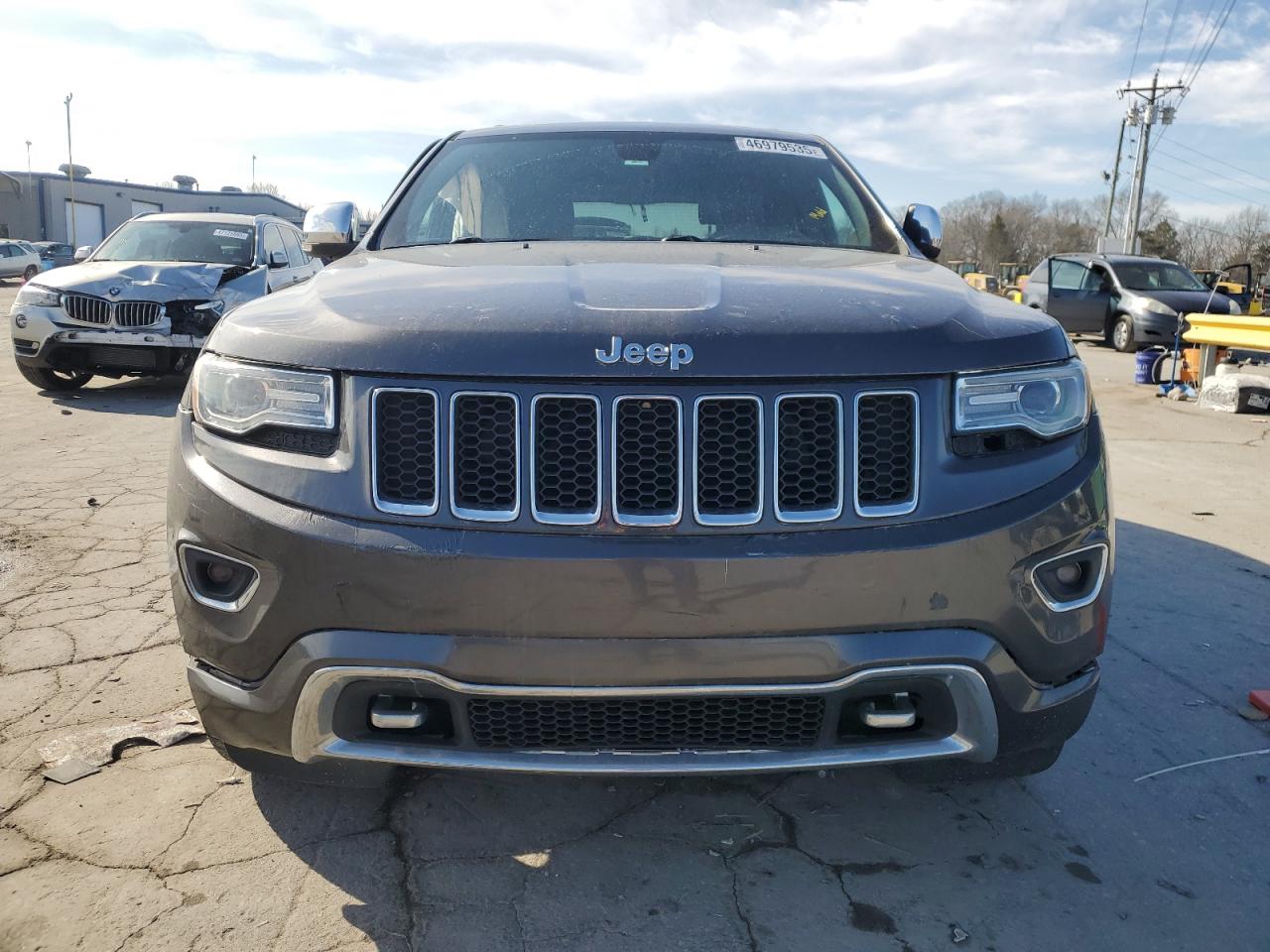 2015 Jeep Grand Cherokee VIN 1C4RJFCG5FC130573 Copart auction photo, side damage thumbnail 5