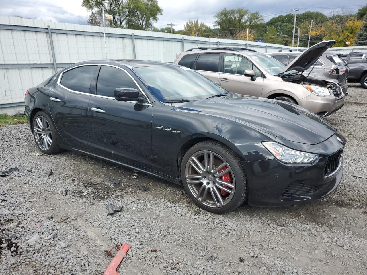 2016 Maserati Ghibli VIN ZAM57RTAXG1167752 Copart auction photo, water/flood damage thumbnail 4