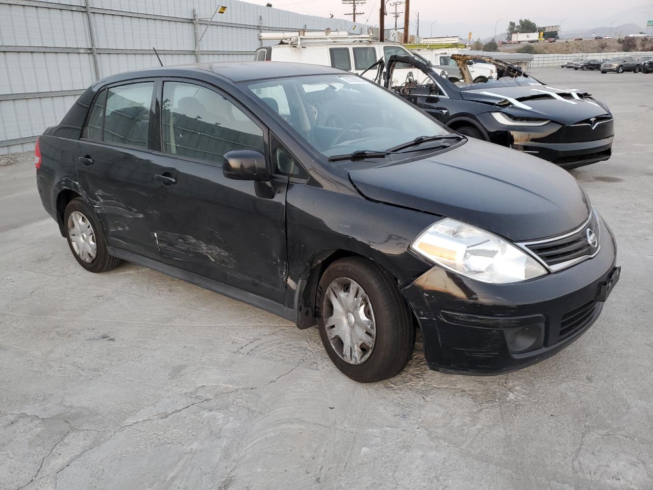 2010 Nissan Versa VIN 3N1BC1AP2AL414082 Copart auction photo, all over damage thumbnail 4
