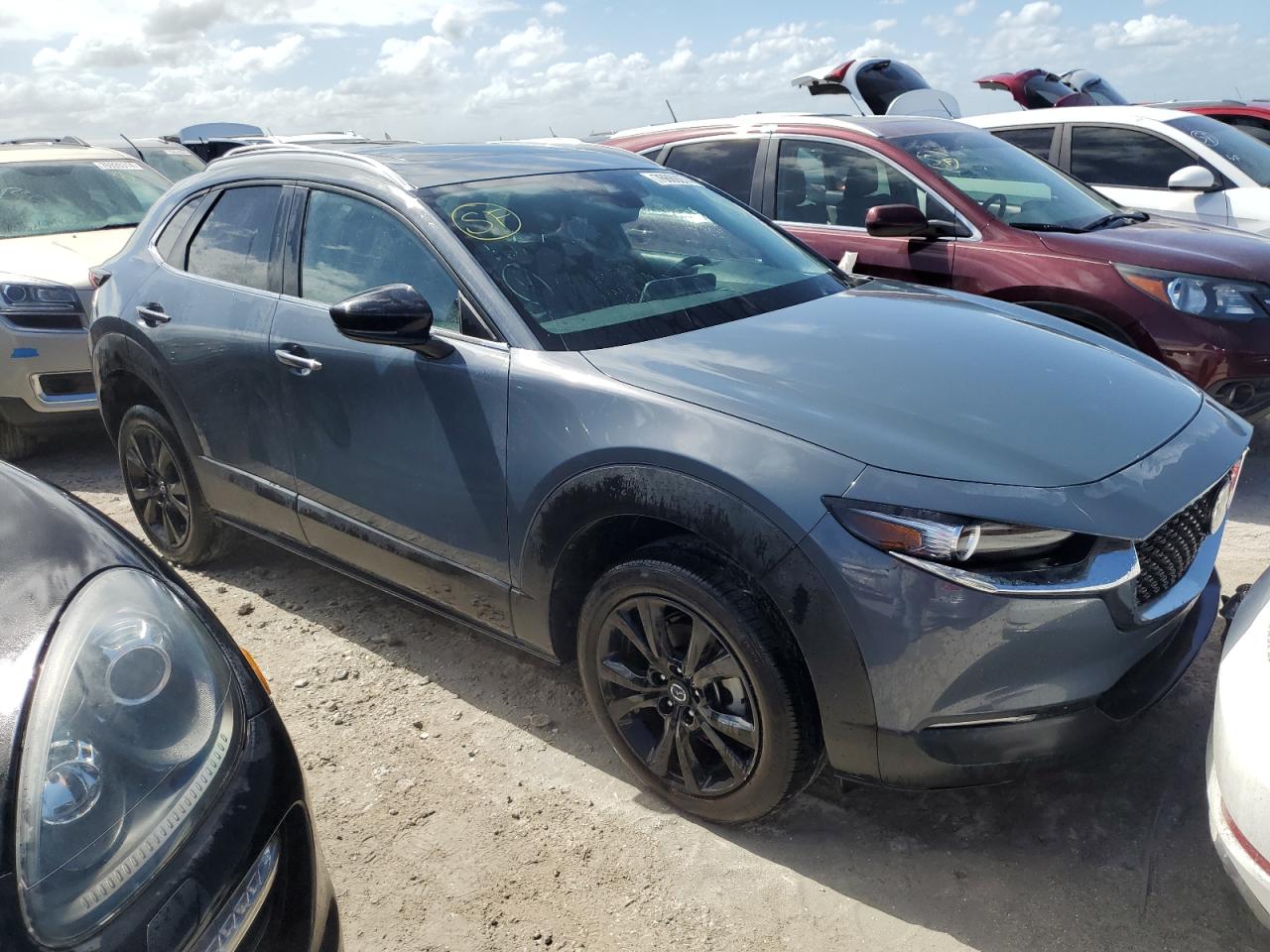2022 Mazda CX-30 VIN 3MVDMBCL1NM407710 Copart auction photo, water/flood damage thumbnail 4