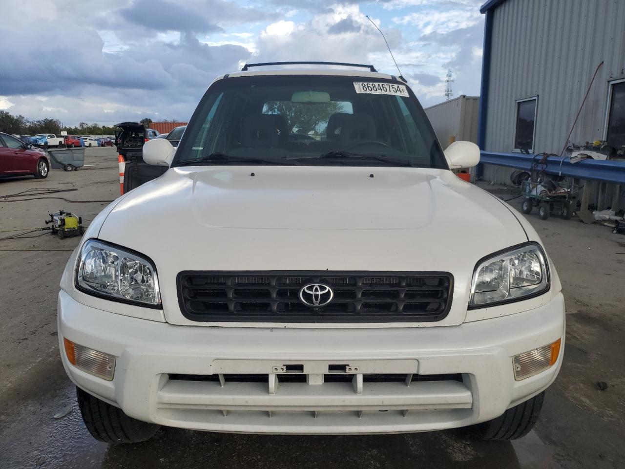 2000 Toyota RAV 4 VIN JT3GP10V0Y7072948 Copart auction photo, rear end damage thumbnail 5
