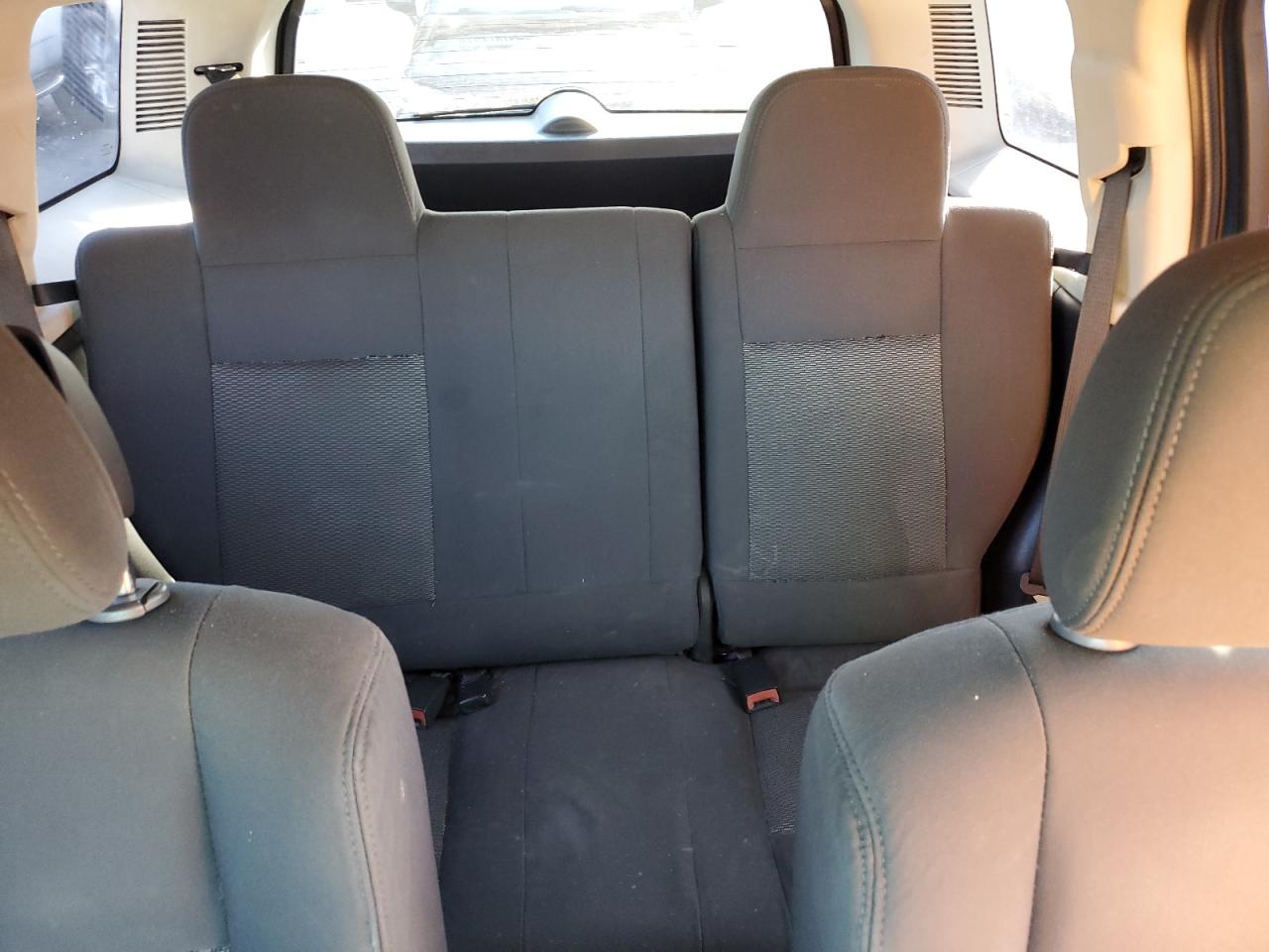 2010 Jeep Liberty (Patriot) VIN 1J4NT2GB9AD501411 Copart auction photo, side / front end damage thumbnail 10