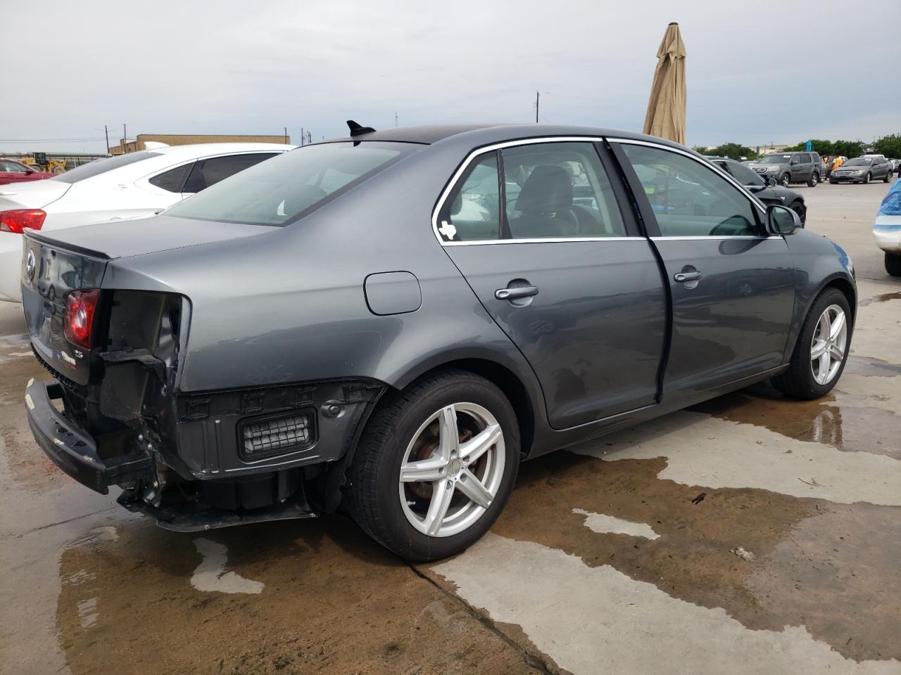 2010 Volkswagen Jetta VIN 3VWRX7AJ3AM009371 Copart auction photo, rear end / water/flood damage thumbnail 3