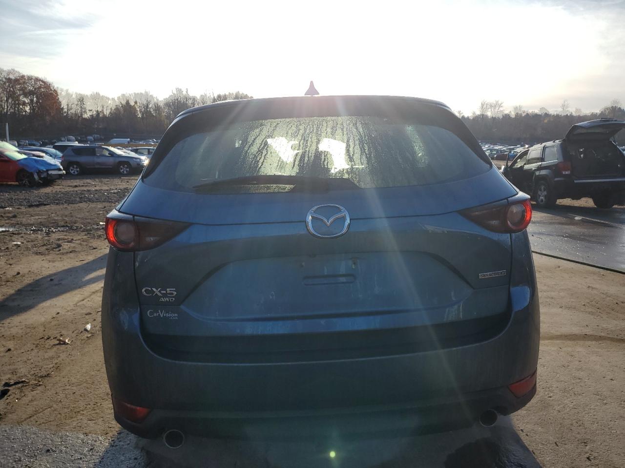 2020 Mazda CX-5 VIN JM3KFBBM8L0806831 Copart auction photo, front end / minor dent/scratches damage thumbnail 6