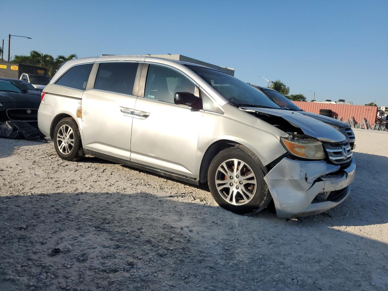 2012 Honda Odyssey VIN 5FNRL5H64CB105800 Copart auction photo, front end / side damage thumbnail 4