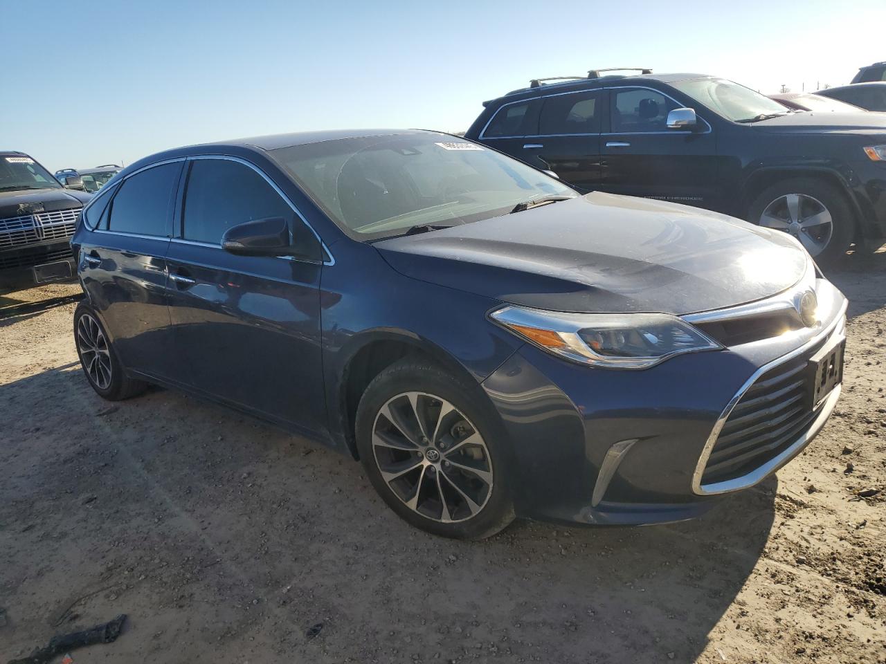 2018 Toyota Avalon VIN 4T1BK1EB6JU285005 Copart auction photo, rear end / minor dent/scratches damage thumbnail 4