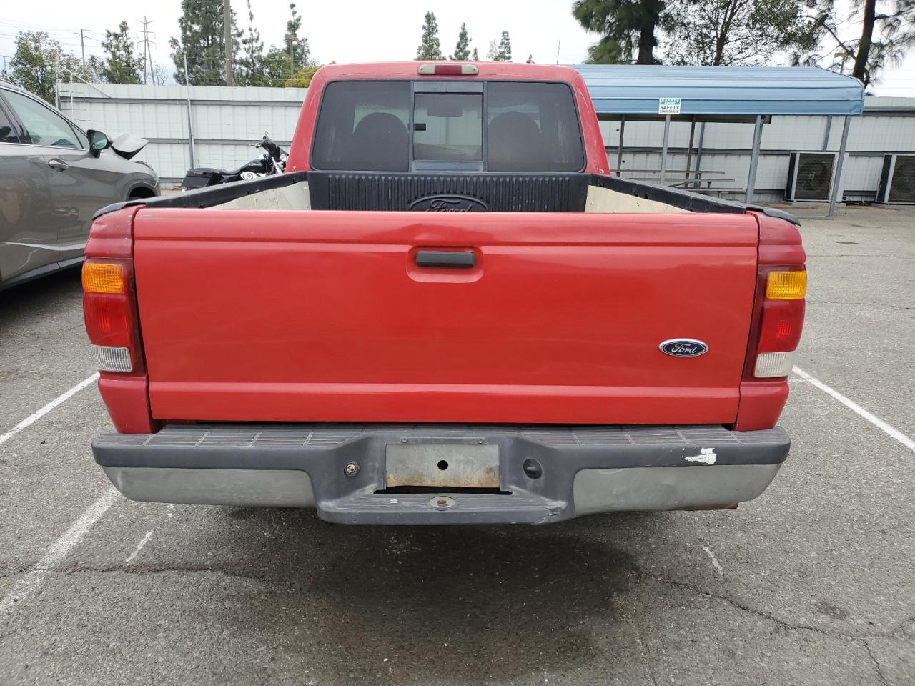 1999 Ford Ranger VIN 1FTYR14V9XPC02244 Copart auction photo, front end / all over damage thumbnail 6