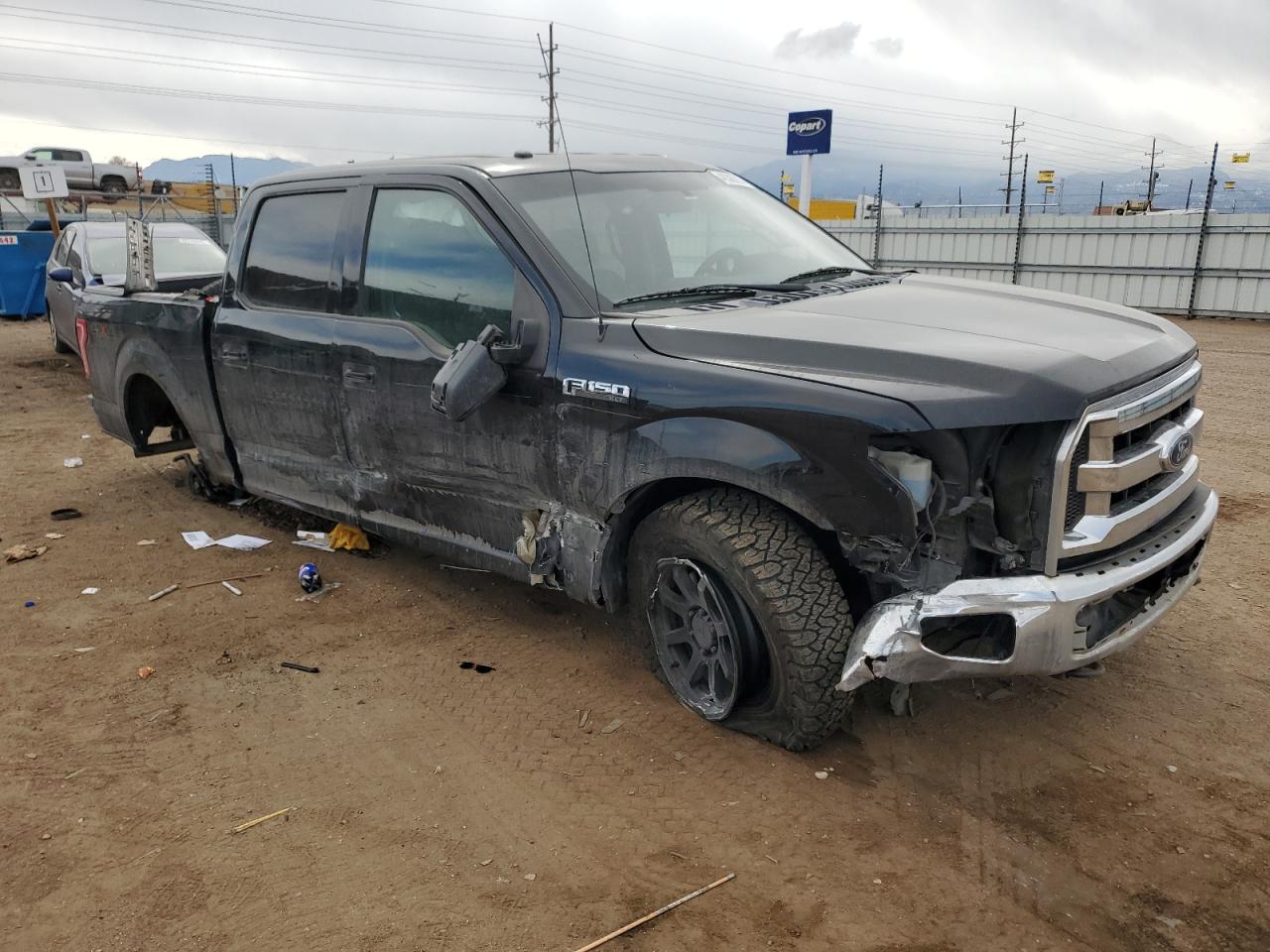 2017 Ford F-150 VIN 1FTEW1E85HFA35022 Copart auction photo, rollover damage thumbnail 4