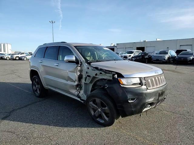 2015 Jeep Grand Cherokee VIN 1C4RJFCG7FC673181 Copart auction photo, front end / side damage thumbnail 11