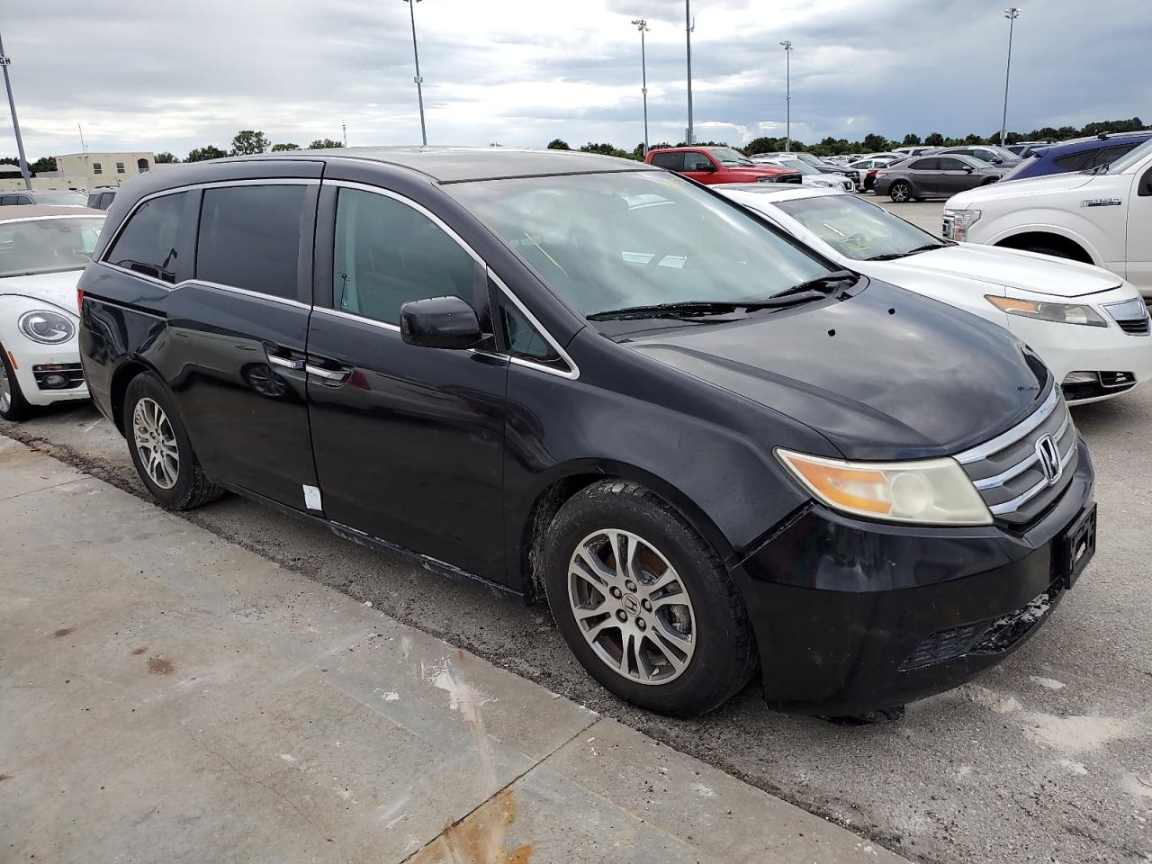2011 Honda Odyssey VIN 5FNRL5H42BB097435 Copart auction photo, water/flood damage thumbnail 4