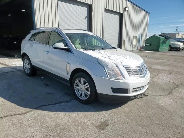 2015 Cadillac SRX VIN 3GYFNBE38FS618933 Copart auction photo, front end / minor dent/scratches damage thumbnail 12
