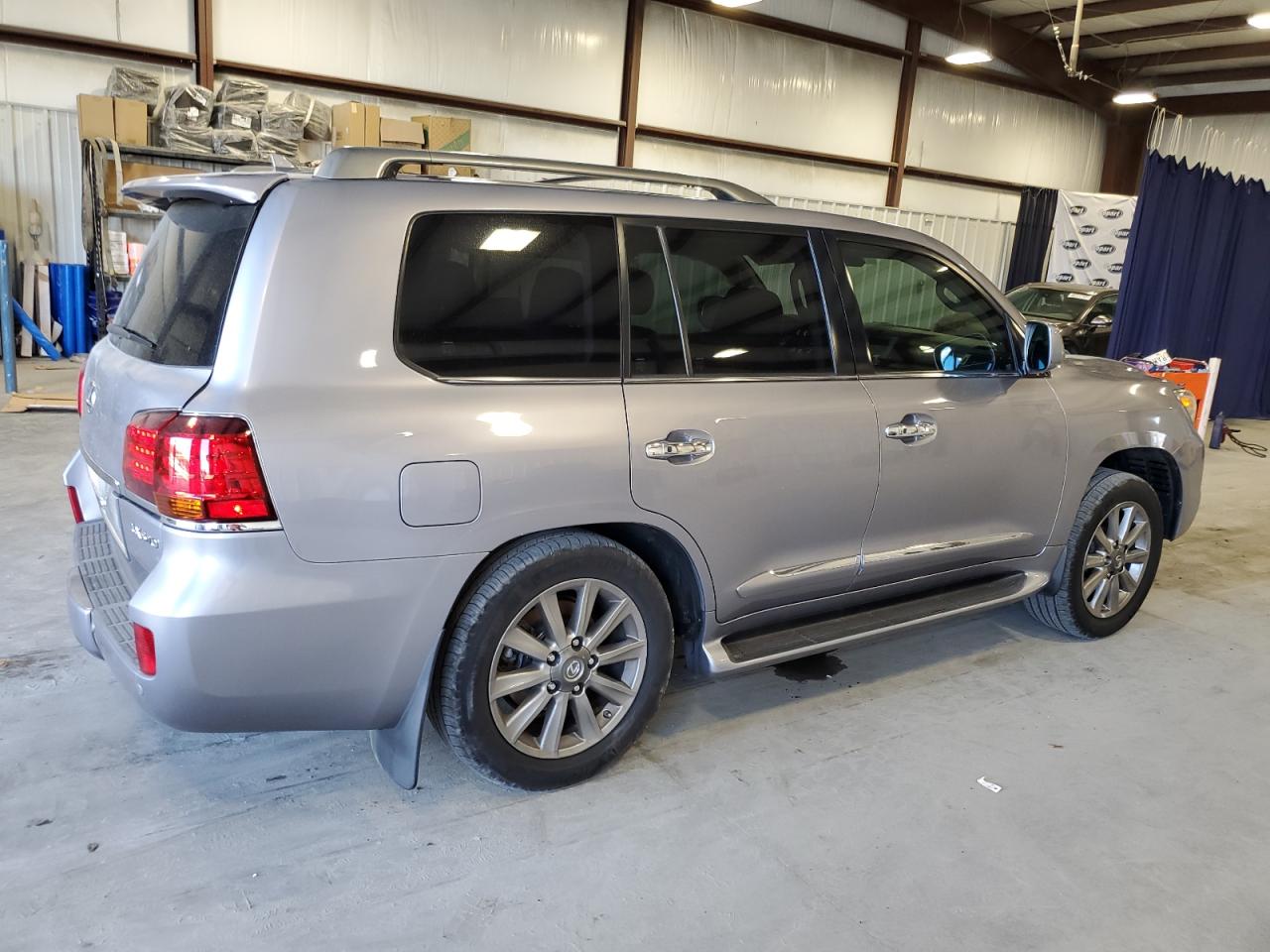 2011 Lexus LX VIN JTJHY7AX2B4071418 Copart auction photo, side / rear end damage thumbnail 3