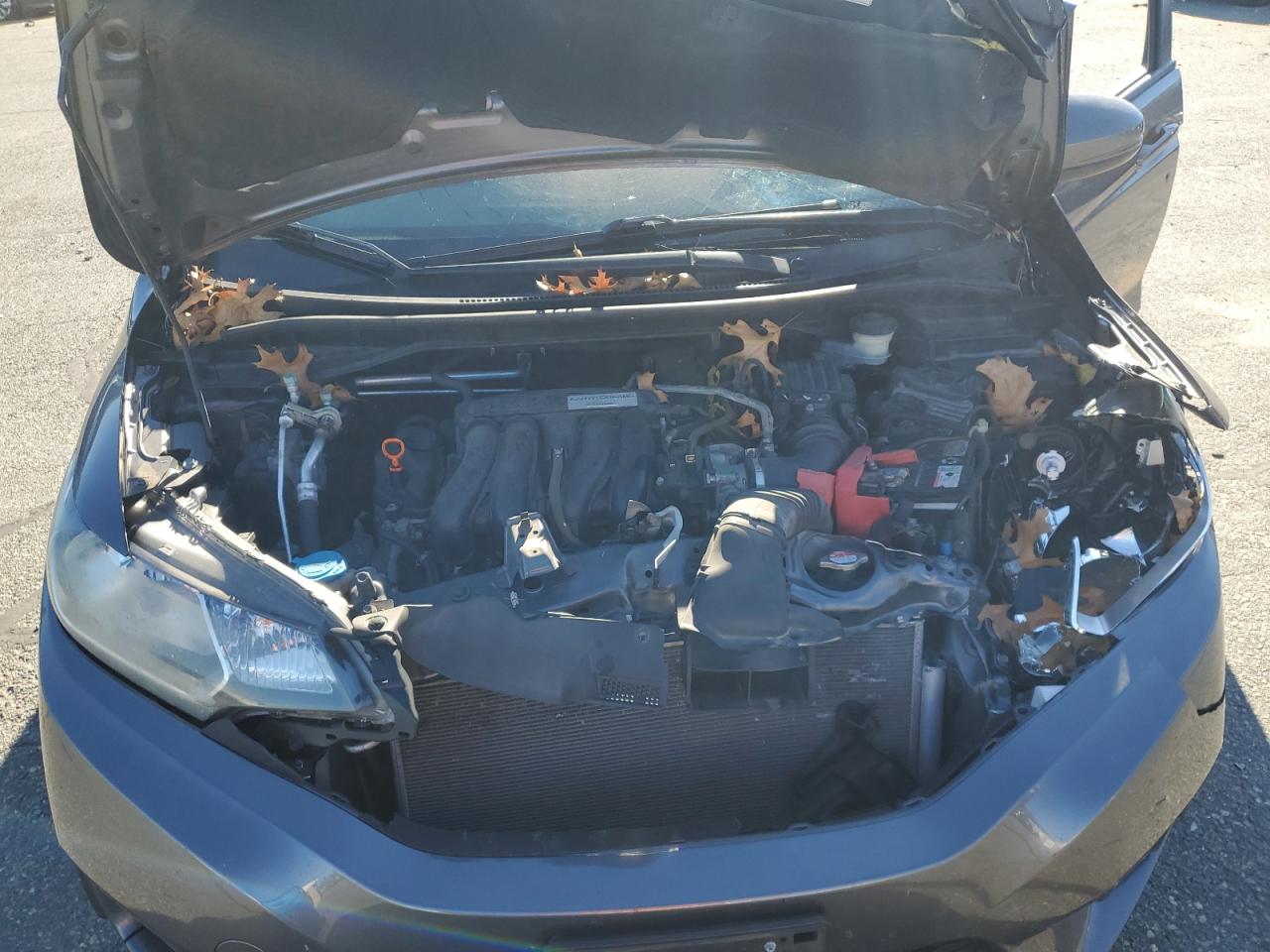 2016 Honda Fit VIN JHMGK5H55GX030374 Copart auction photo, front end / minor dent/scratches damage thumbnail 12