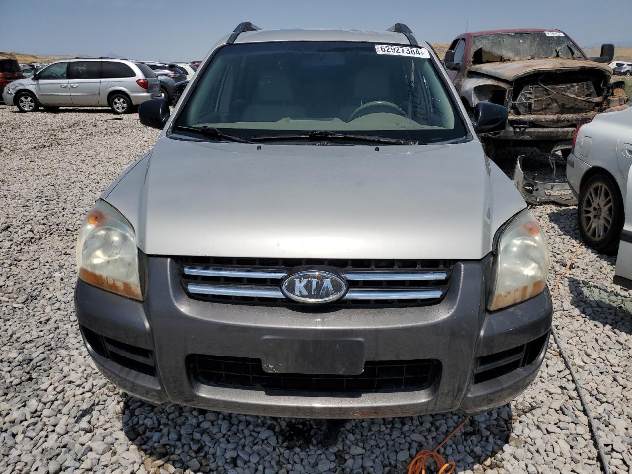2006 KIA Sportage VIN KNDJF724767145192 Copart auction photo, side / front end damage thumbnail 5