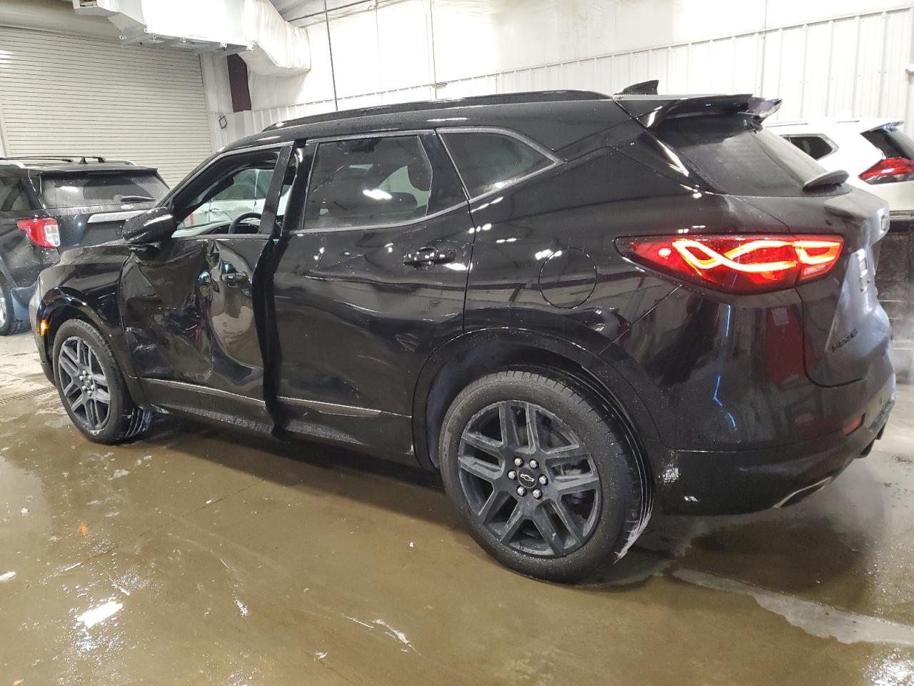 2023 Chevrolet Blazer VIN 3GNKBKRSXPS230691 Copart auction photo, side / front end damage thumbnail 2