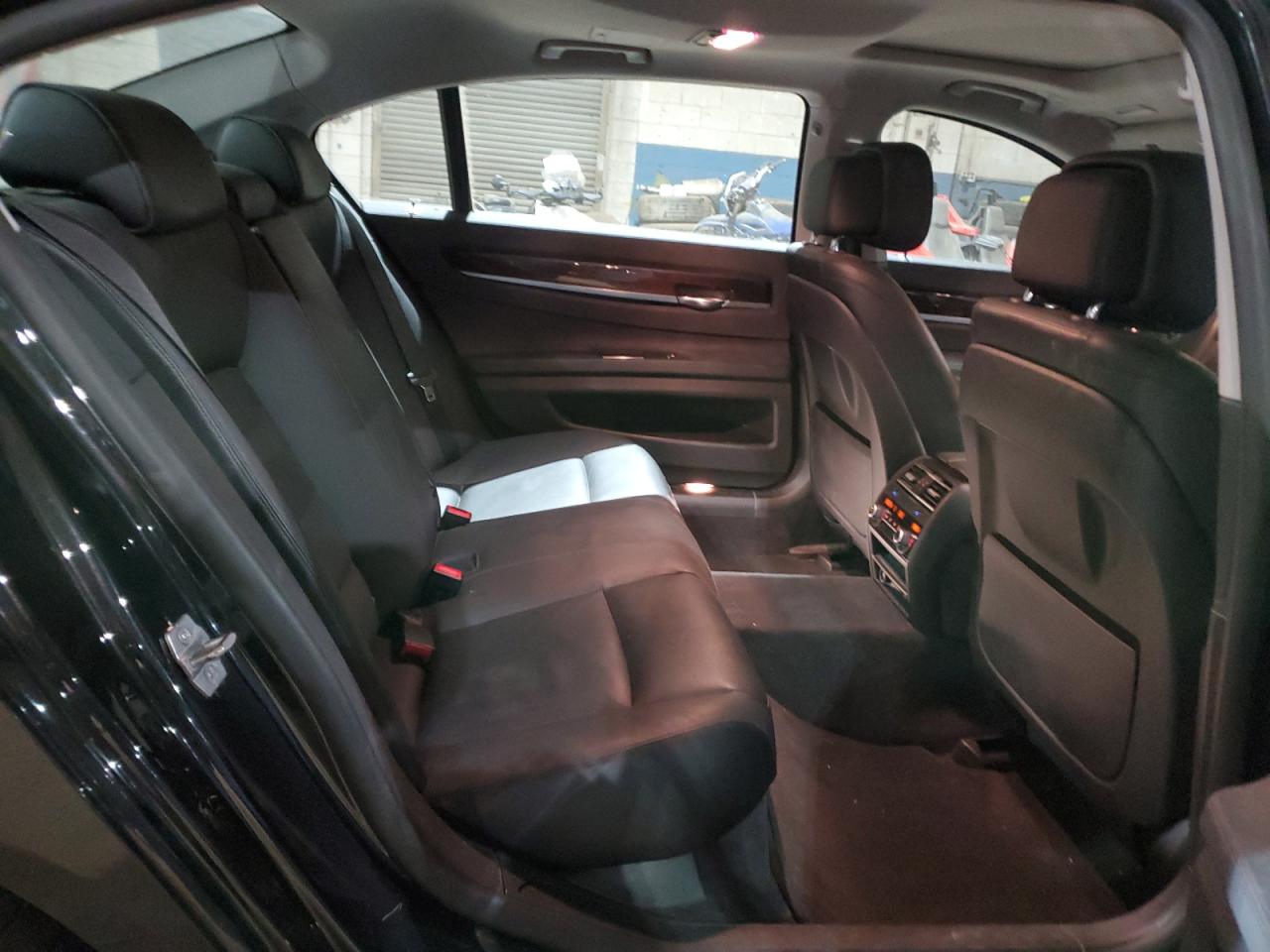 2015 BMW 7er VIN WBAYF4C55FG291706 Copart auction photo, front end damage thumbnail 11