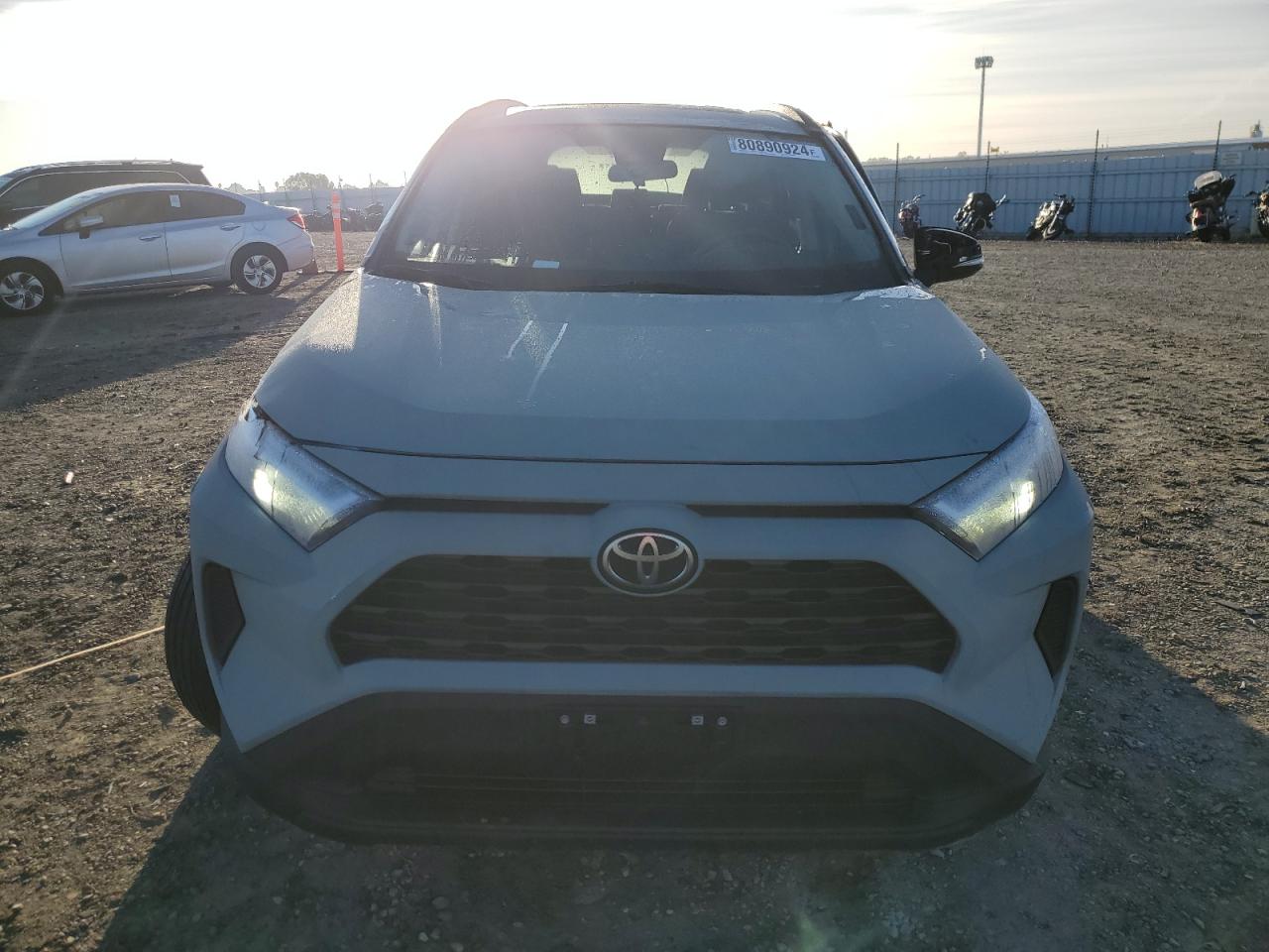2022 Toyota RAV 4 VIN 2T3W1RFV0NW211412 Copart auction photo, all over damage thumbnail 5