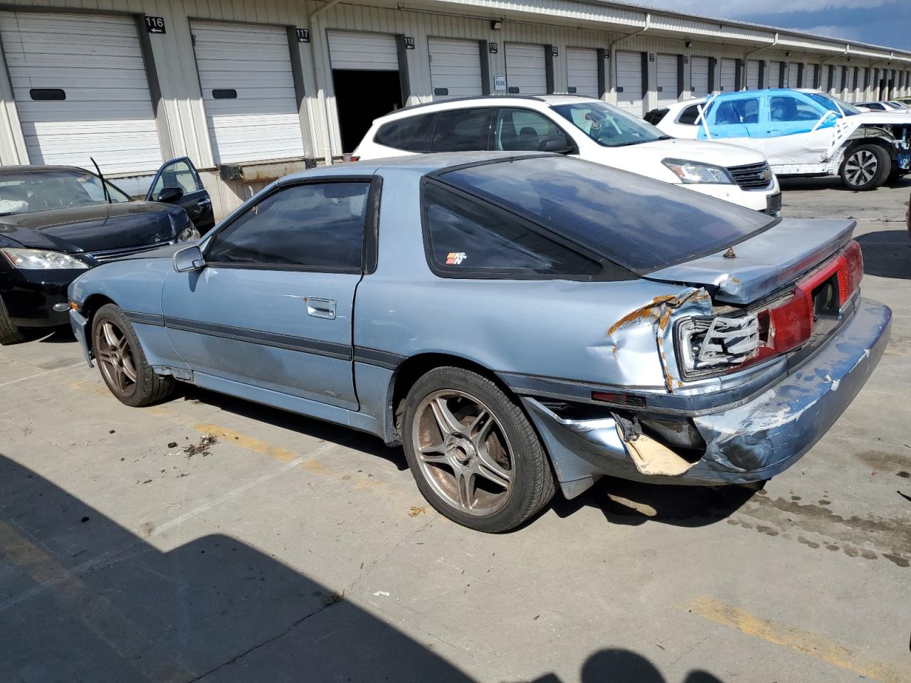 1989 Toyota Supra VIN JT2MA70J8K0120446 Copart auction photo, rear end / all over damage thumbnail 2