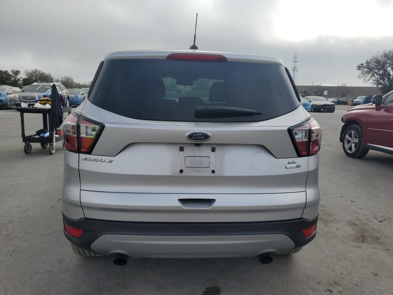 2017 Ford Escape VIN 1FMCU9GD9HUE39504 Copart auction photo, minor dent/scratches damage thumbnail 6