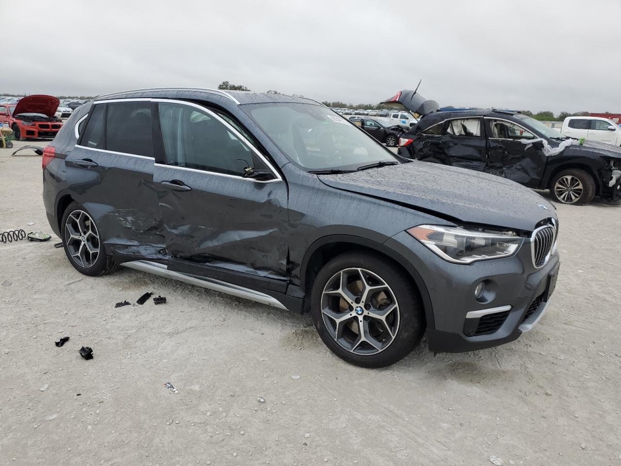 2017 BMW X1 VIN WBXHT3C37H5F79218 Copart auction photo, all over damage thumbnail 4