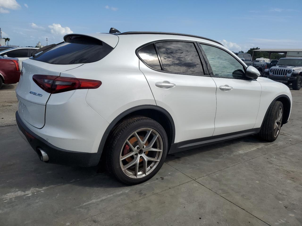 2018 Alfa Romeo Stelvio VIN ZASFAKNNXJ7B89294 Copart auction photo, water/flood damage thumbnail 3